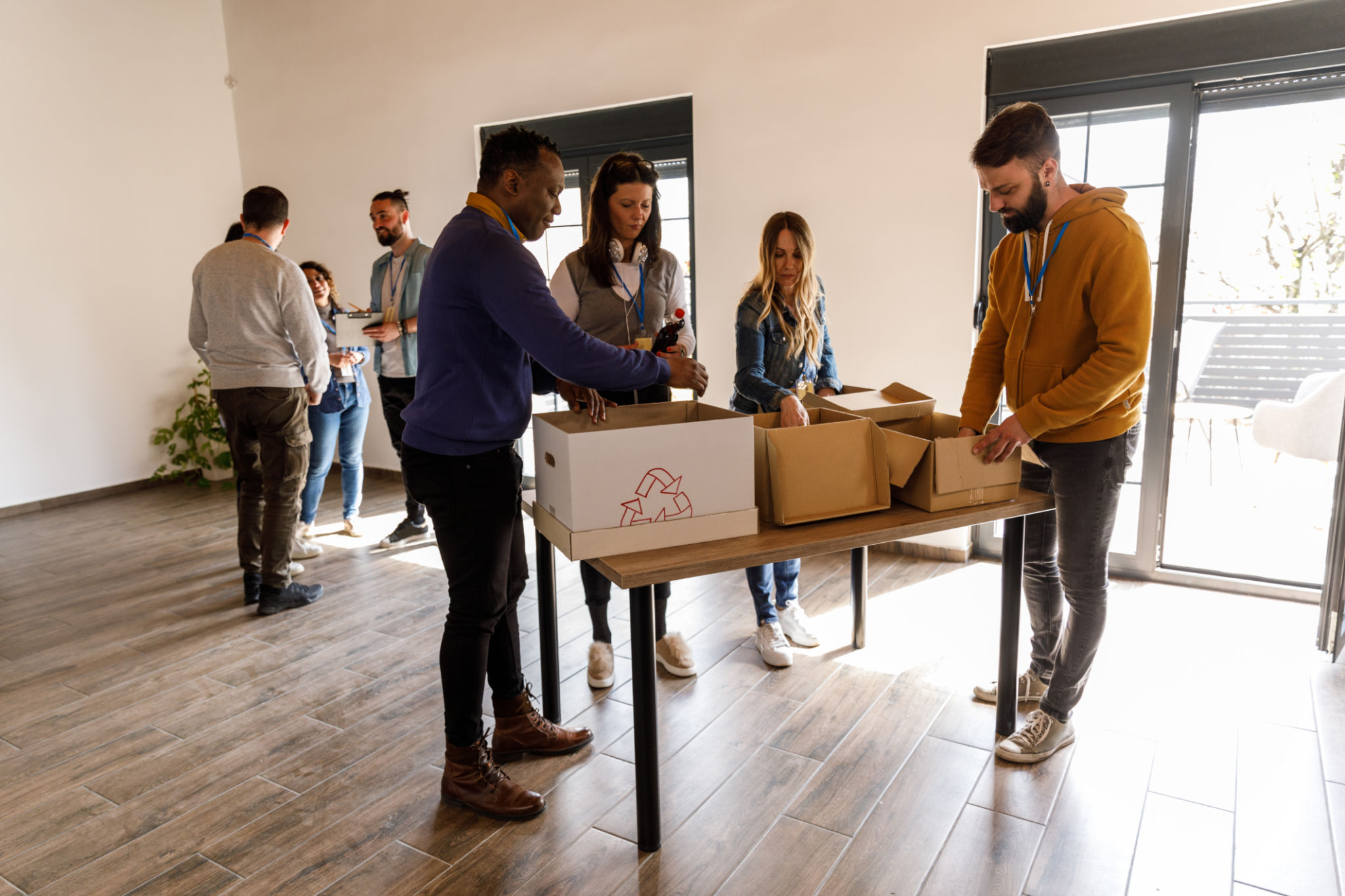 Community volunteers working with donation boxes