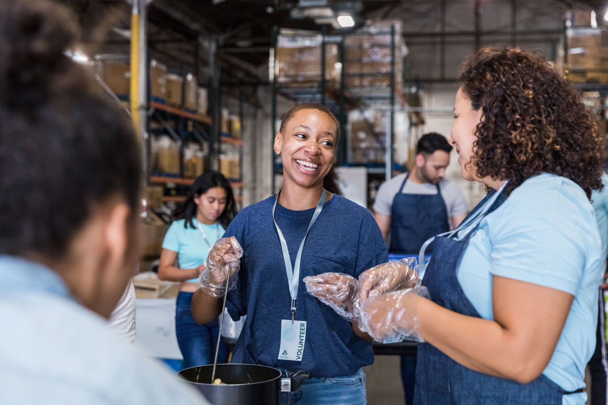 Multiracial group volunteering at a food drive